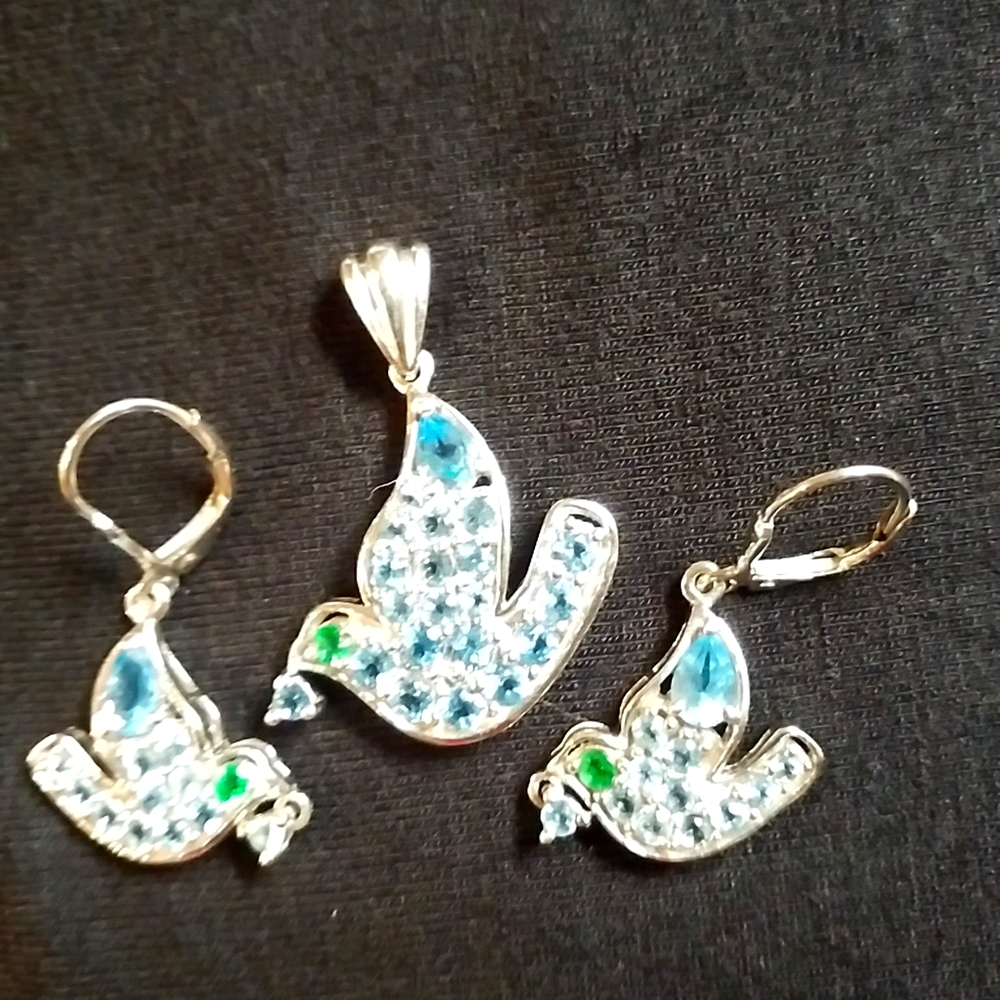 Silver and gemstone bird pendant and earring set.